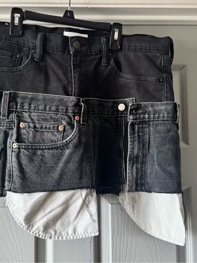 A Vintage Fit black Levi’s distressed avant asymmetrical shirt